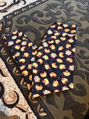 LuLaRoe Black Leggings with Orange Fish Print